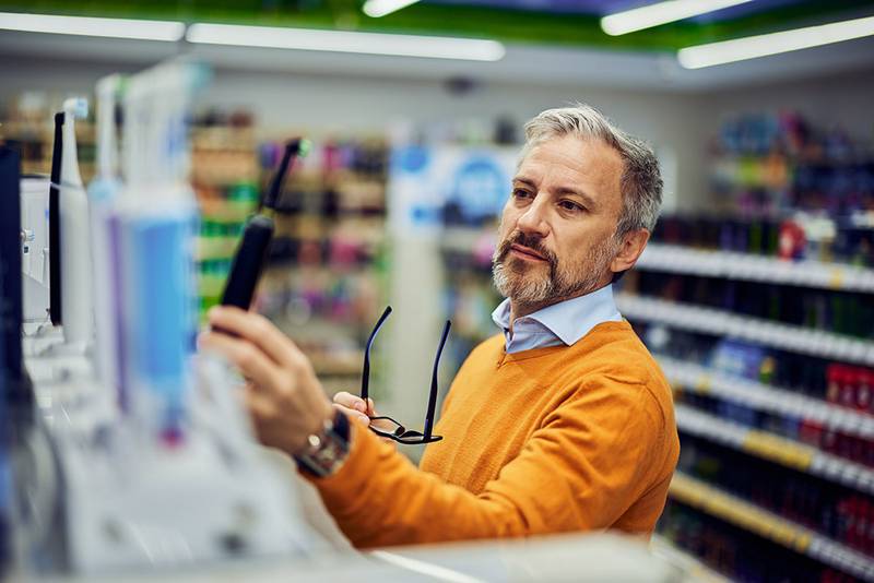 A self-employed man in his late fifties out at a store