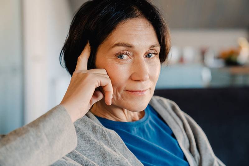 A divorced woman reviewing her benefit options