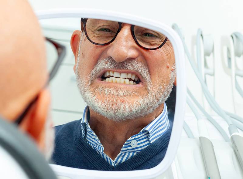 An older man at the dentist